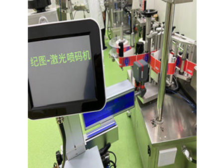 激光噴碼機(jī)配貼標(biāo)機(jī)